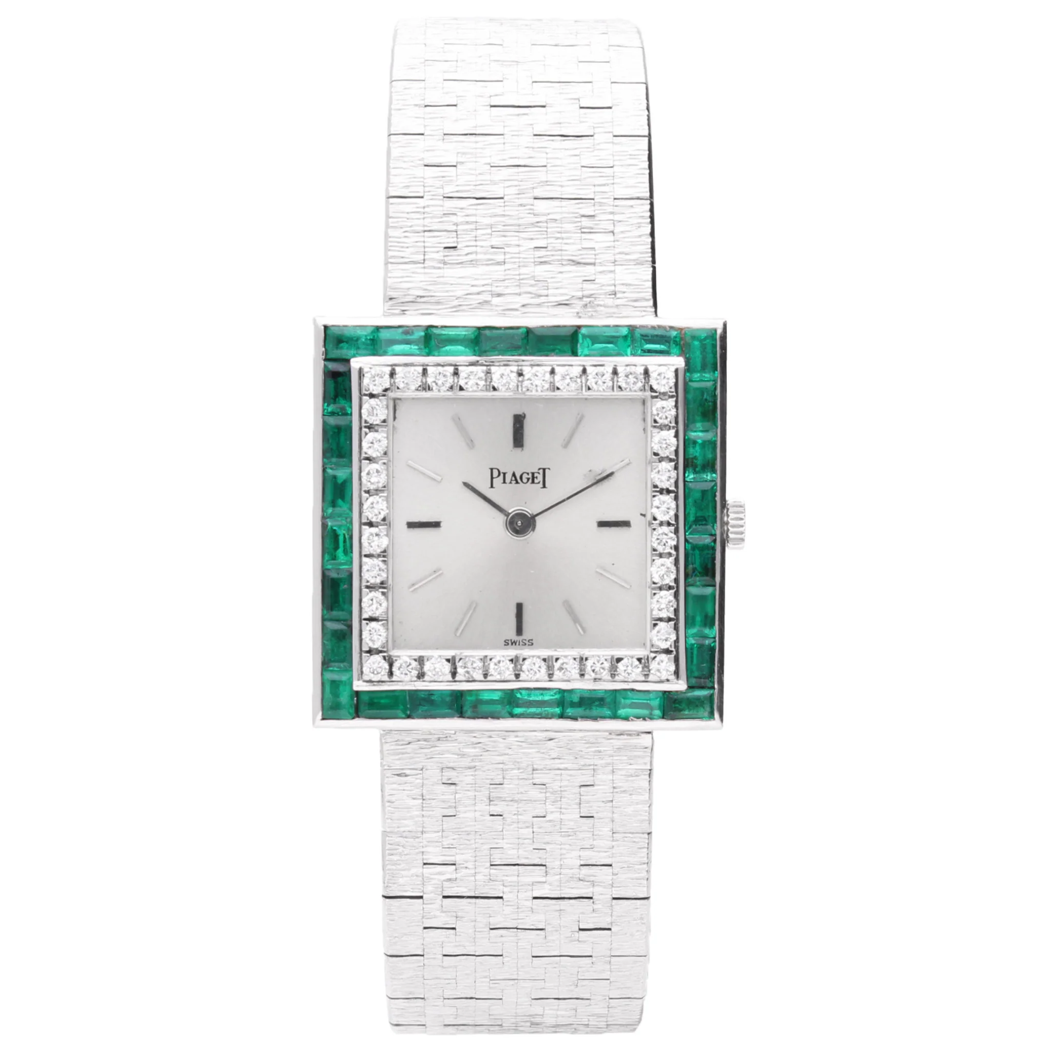 18ct white gold Piaget ref. 9203 square case bracelet watch with diamond and emerald set bezel. Made 1970